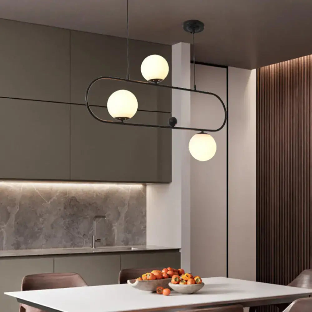 Modern black minimalist ellipse ceiling light with white globes living room