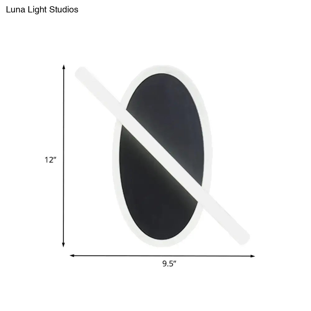 Modern black & white oval led sconce stairway light with warm glow
