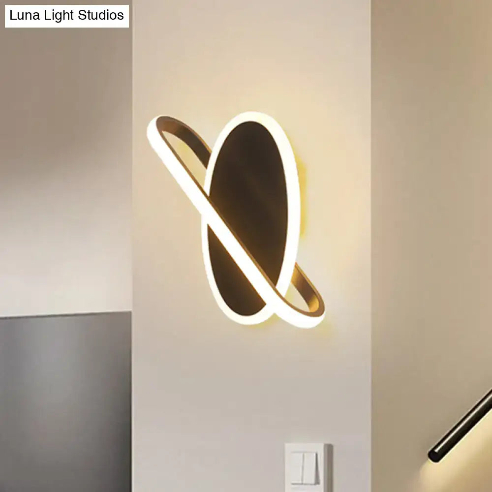 Modern black & white oval led sconce stairway light with warm glow