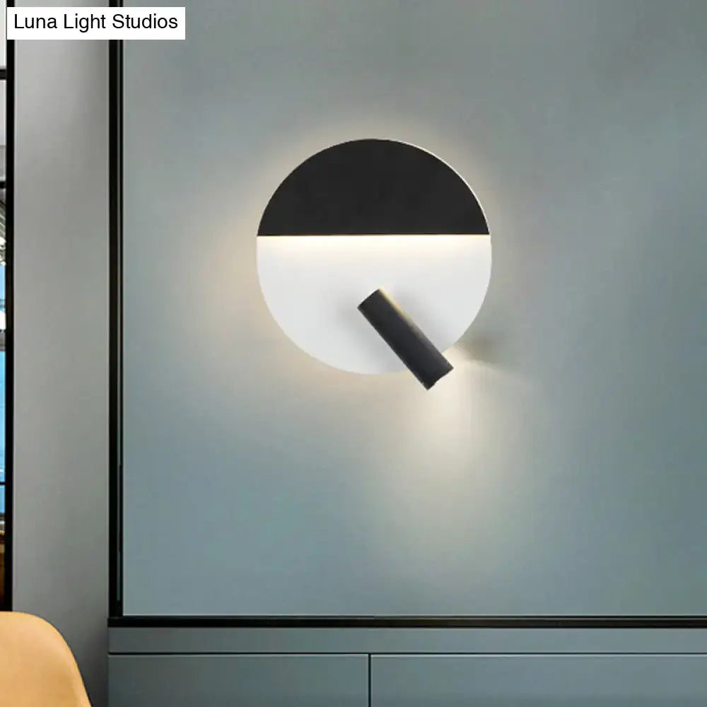 Modern black & white wall sconce with adjustable spotlight – bedroom