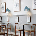 Modern blue metallic bell wall sconce – restaurant perforated light