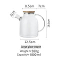 DecorBites™ 1.8L Transparent Borosilicate Glass Teapot | Heat-Resistant Flower Tea Set