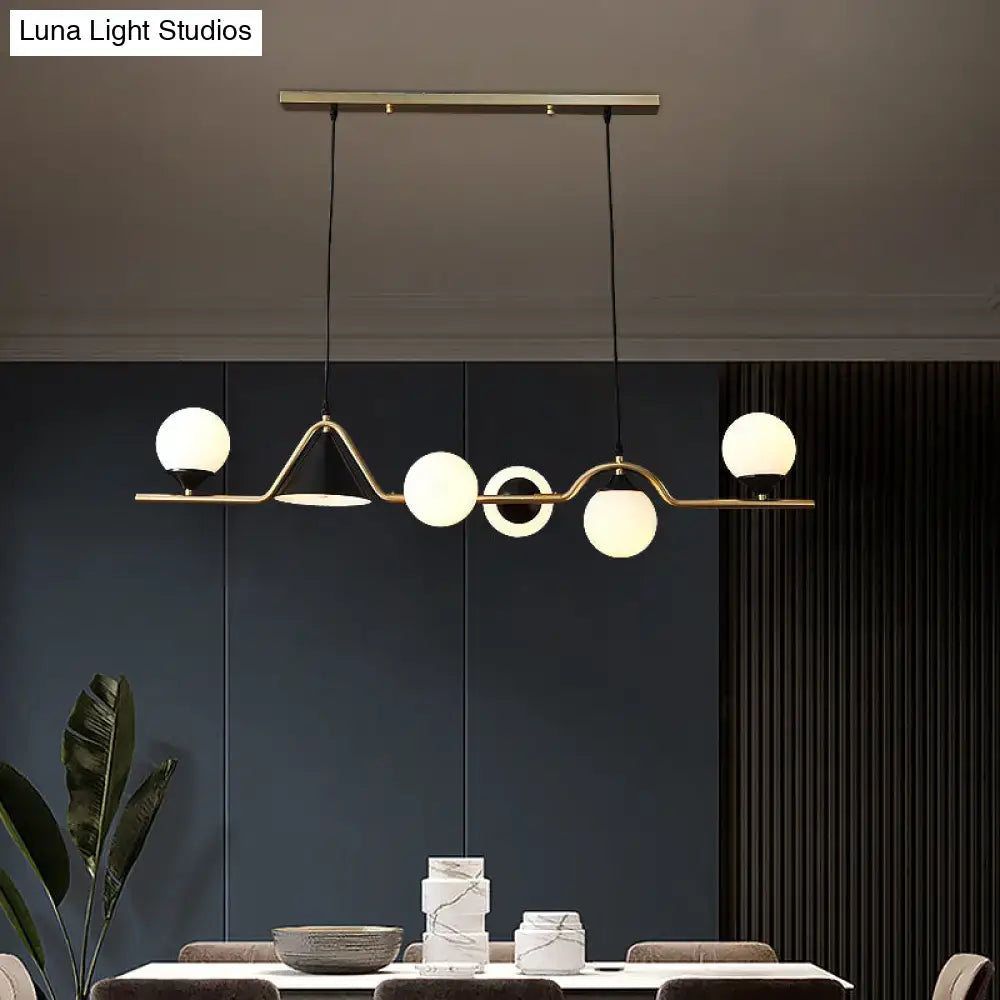 Modern brass and black 3 light hanging island light for dining room