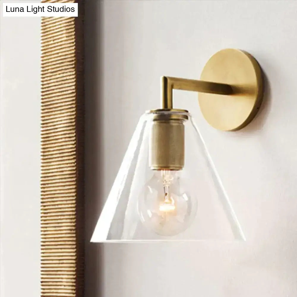 Modern brass and glass wall sconce bedroom light