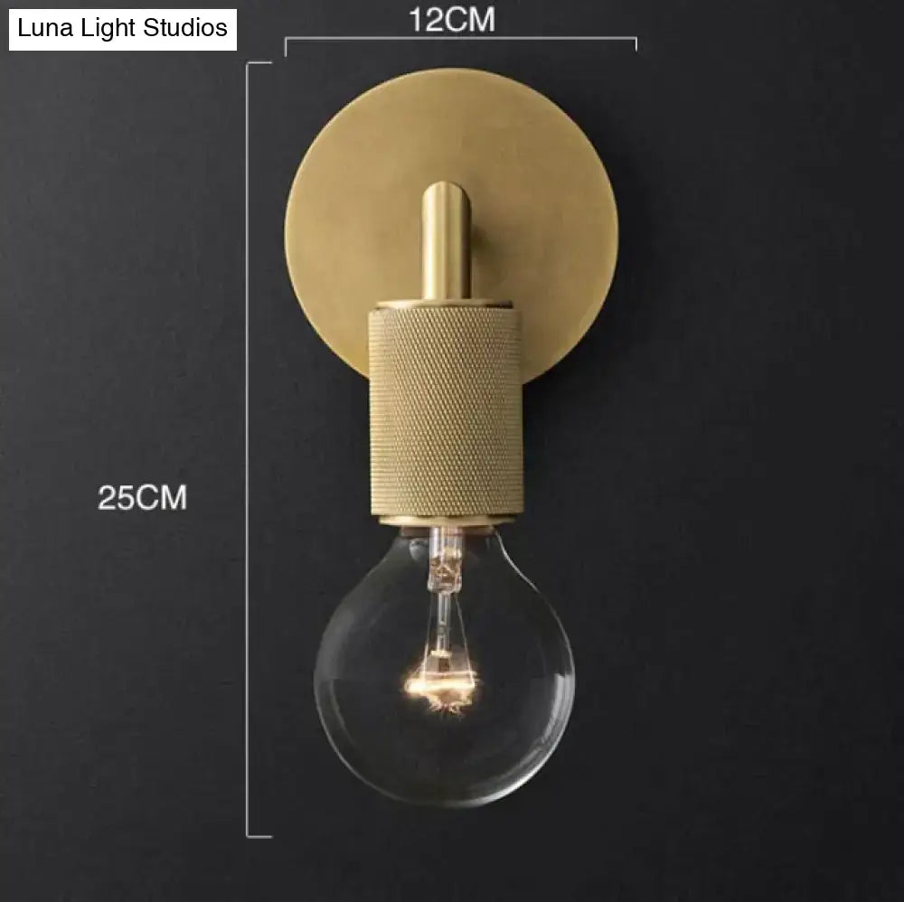 Modern brass and glass wall sconce bedroom light