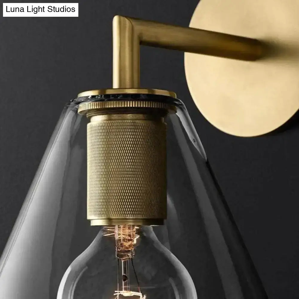 Modern brass and glass wall sconce bedroom light