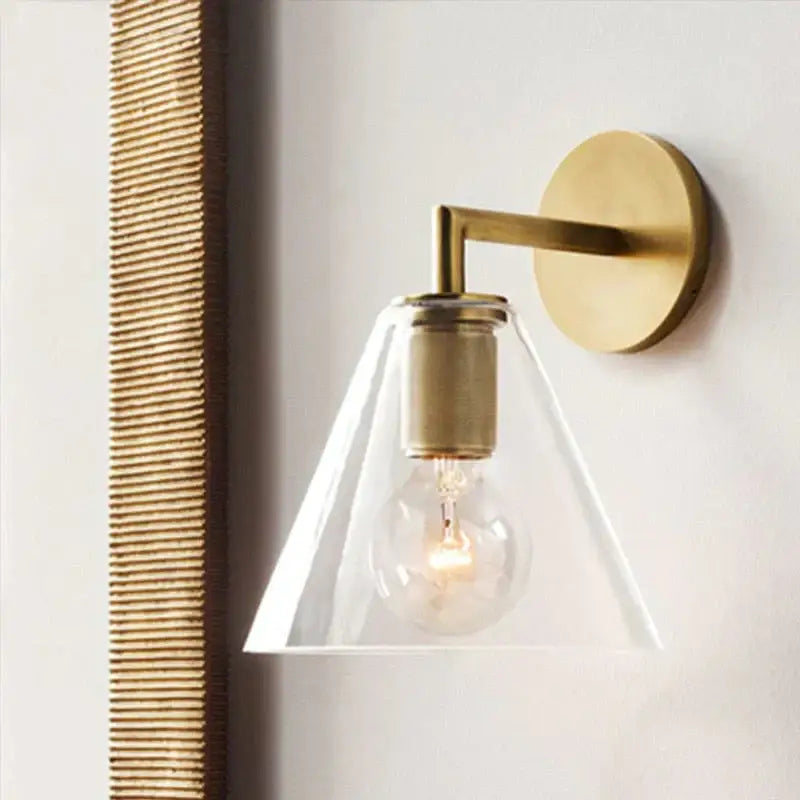 Modern brass and glass wall sconce bedroom light