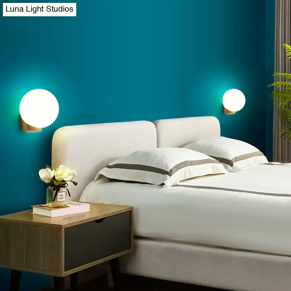 Modern brass and opal glass wall mount lamp bedside bedroom sconce
