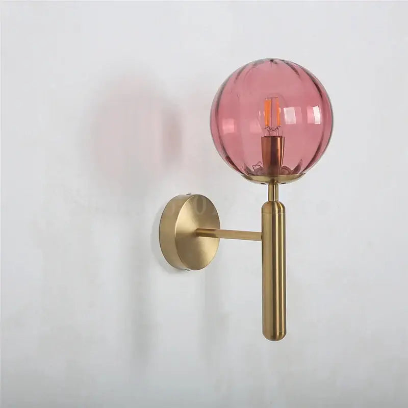 Modern brass and pink glass wall lamp for living room
