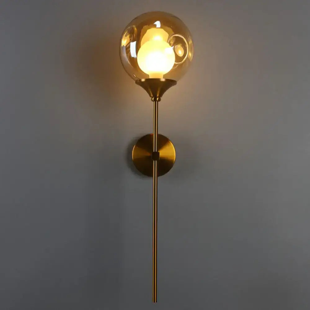 Modern brass and smoke gray glass wall light bedroom sconce