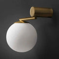 Modern brass and white glass sphere wall sconce bedroom light
