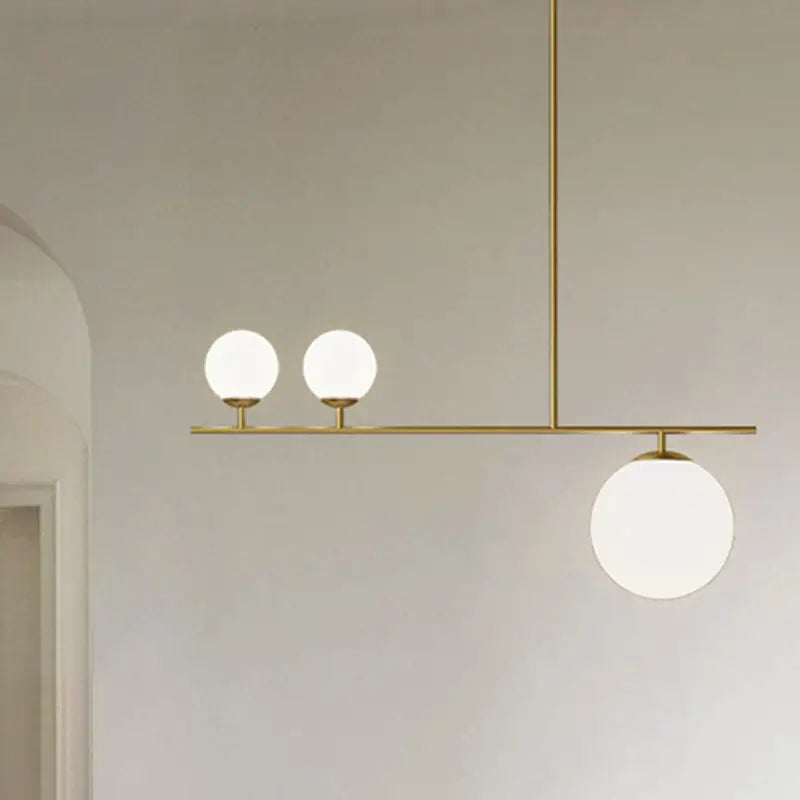 DecorBites™ Minimalistic Brass Ball Pendant Light: Opal Glass Island Lighting for Dining Room (3-Light)