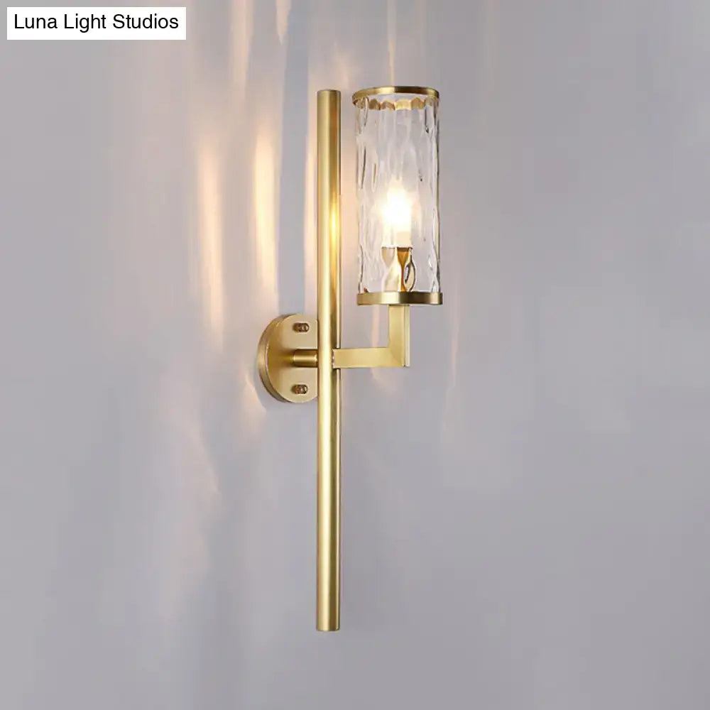 Modern brass cylinder sconce with clear water glass bedroom wall lamp
