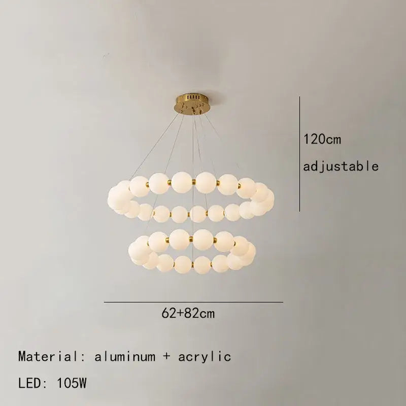 Modern brass led pendant light with frosted spheres for living room