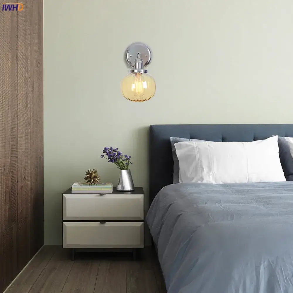 Modern chrome and amber glass ball wall light bedroom sconce