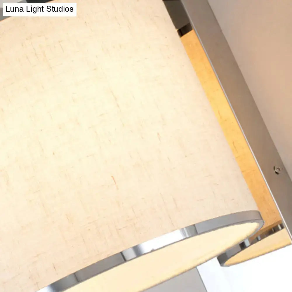 Modern chrome and beige fabric led wall sconce living room light