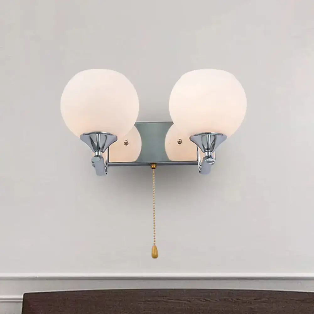 Modern chrome and cream glass wall light bedroom sconce with pull chain