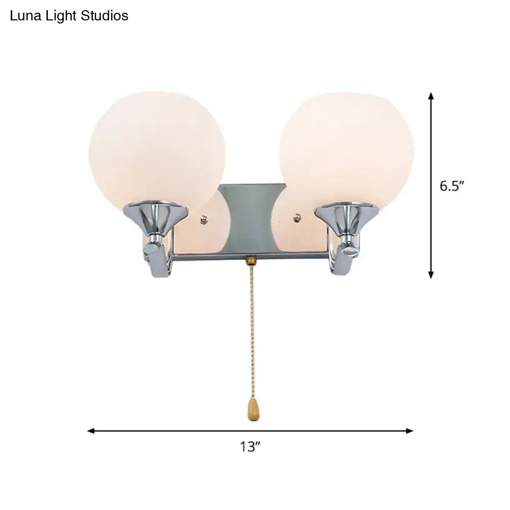 Modern chrome and cream glass wall light bedroom sconce with pull chain
