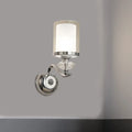 Modern chrome dual cylinder bathroom sconce with curvy arm