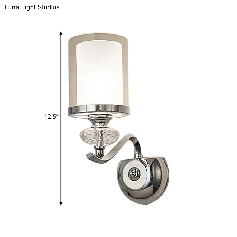 Modern chrome dual cylinder bathroom sconce with curvy arm