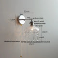 Modern chrome wall light with perforated fabric shade for bedroom