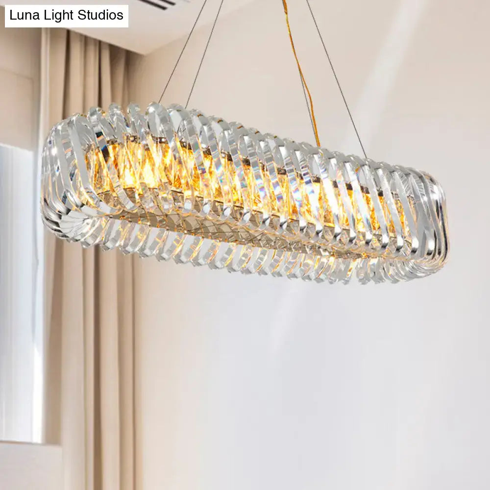 Modern gold and clear crystal oval pendant light for dining room