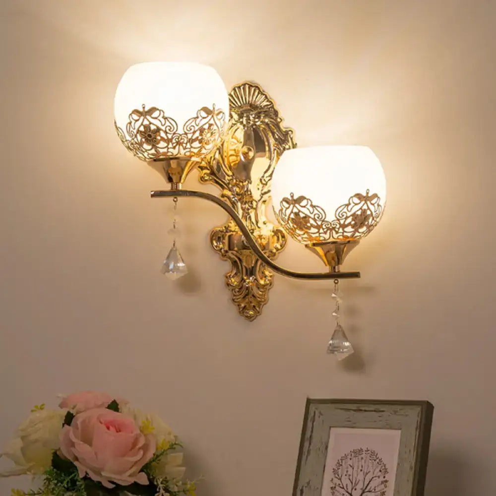 Modern gold finish dome wall sconce with crystals for living room