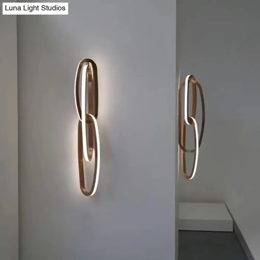 Modern gold interlocking oval led wall lamp living room