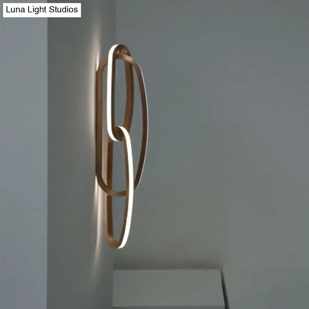 Modern gold interlocking oval led wall lamp living room