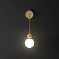 Modern gold sconce light with milky glass – bedroom wall lamp