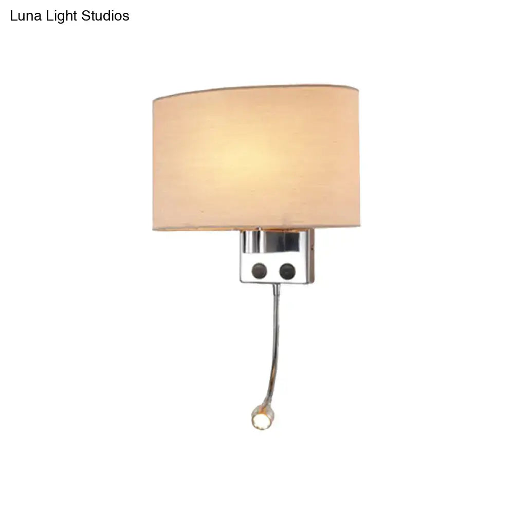 Modern gold wall sconce with fabric shade and bedroom reading light