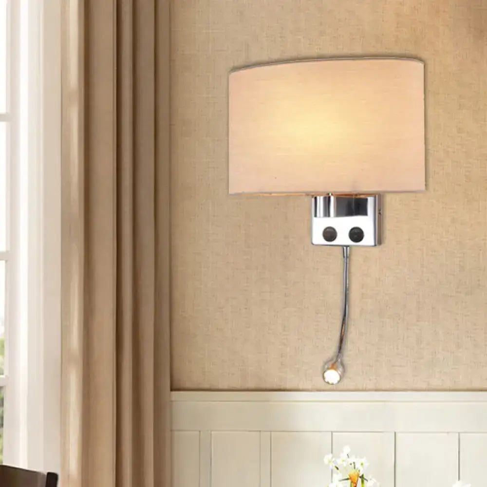 Modern gold wall sconce with fabric shade and bedroom reading light
