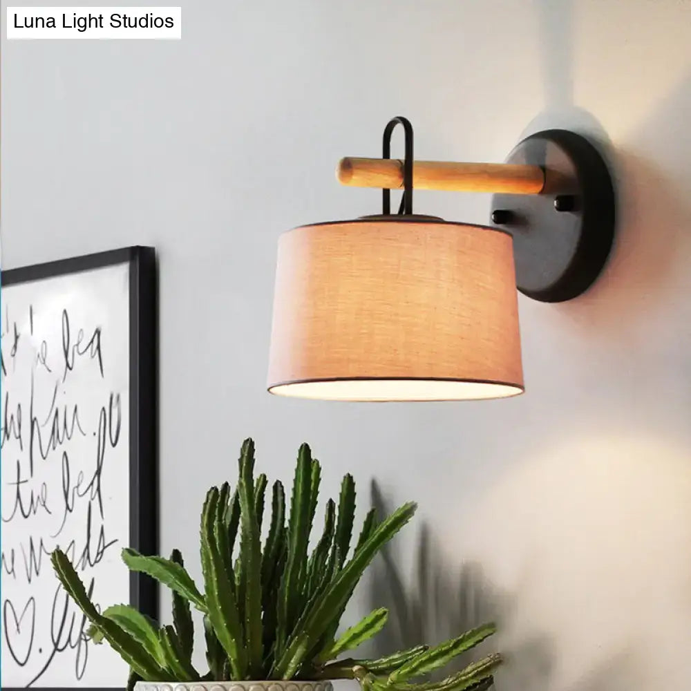 Modern grey drum shade wall lamp with wood arm for bedroom lighting