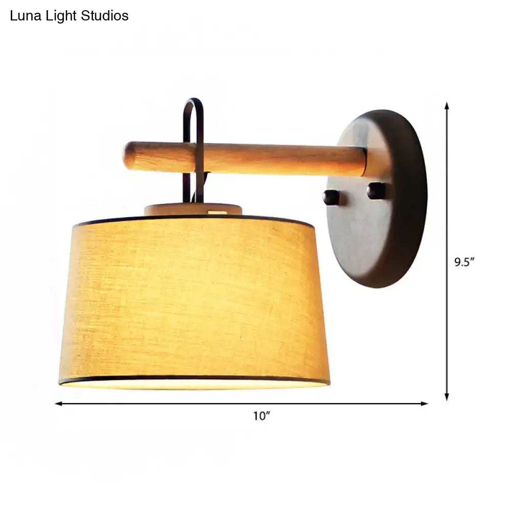 Modern grey drum shade wall lamp with wood arm for bedroom lighting