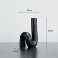 Modern matte black pipe geometric twist knot figurine living room decor