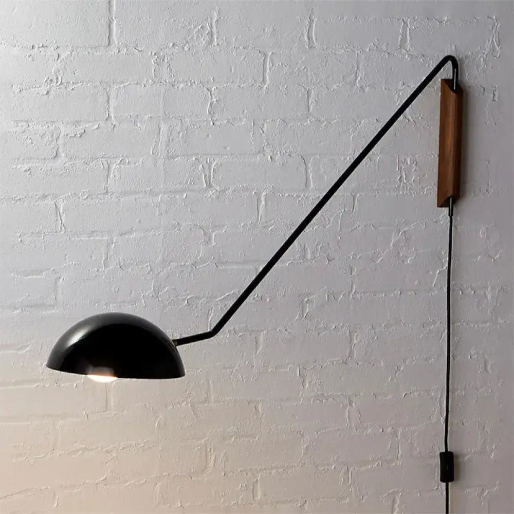 Modern matte black swing arm bedside wall lamp with wood accent bedroom