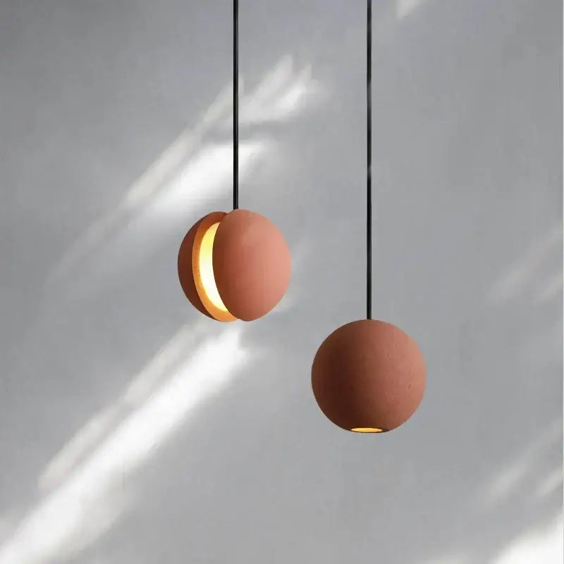 Modern minimalist gray and gold pendant light dining room