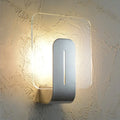 Modern minimalist nickel led bathroom wall sconce with glass shade