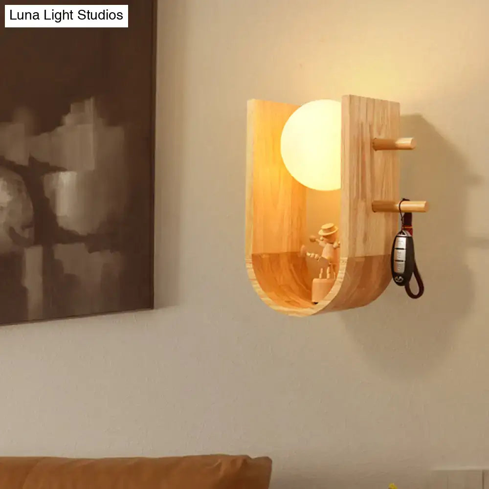 Modern minimalist wooden sconce light with hanging pegs for bedroom