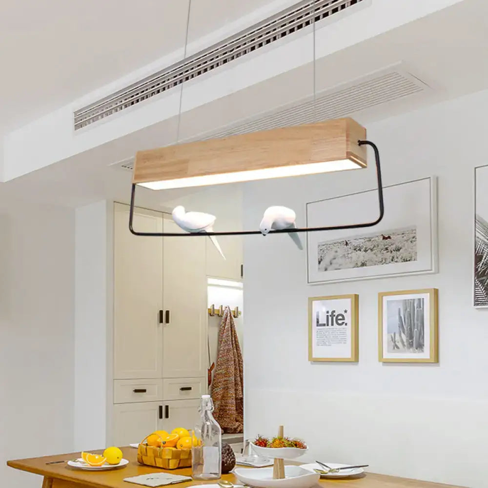 Modern rectangular wood and metal pendant light with birds dining room