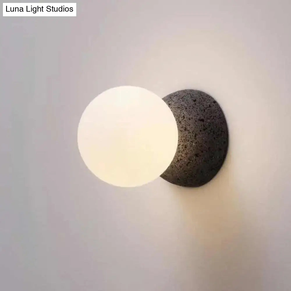 Modern volcanic stone and white glass wall lamp living room
