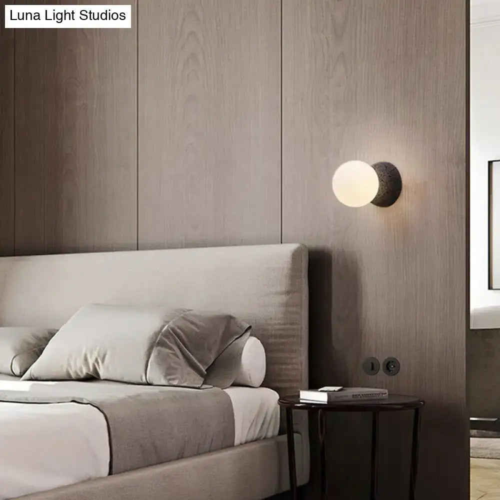 Modern volcanic stone and white glass wall lamp living room