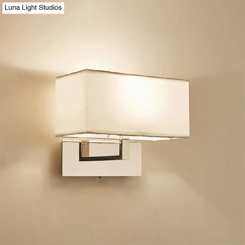 Modern white fabric wall sconce with polished brass for bedroom
