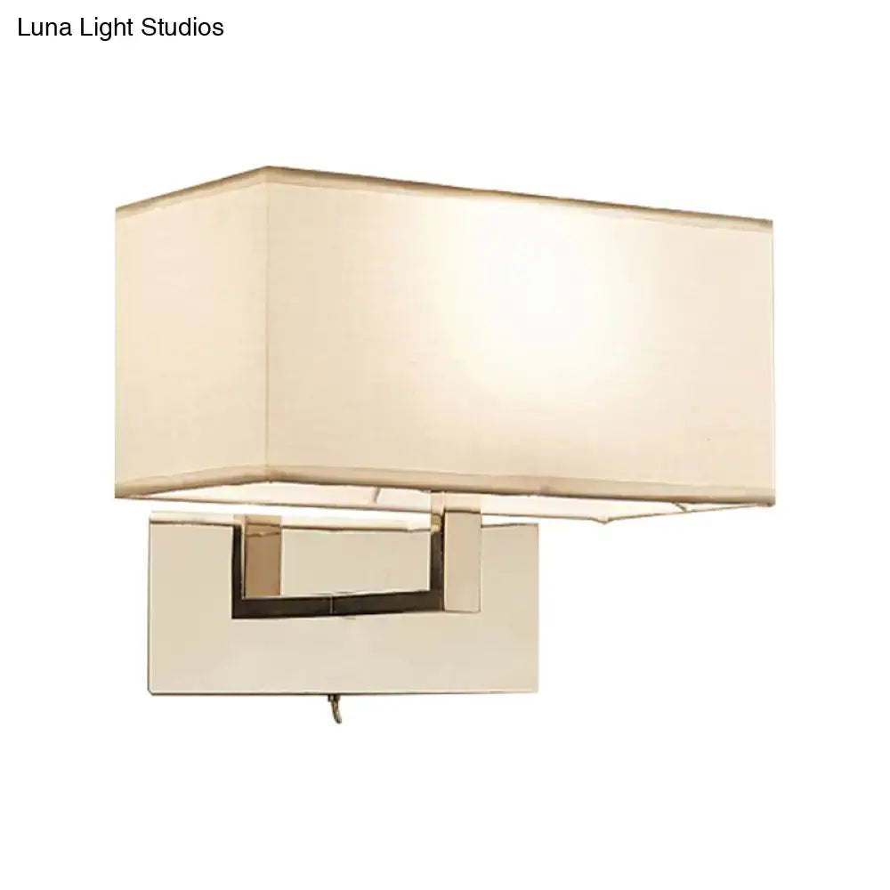 Modern white fabric wall sconce with polished brass for bedroom