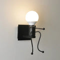 Modern white iron man cartoon wall sconce for bedroom