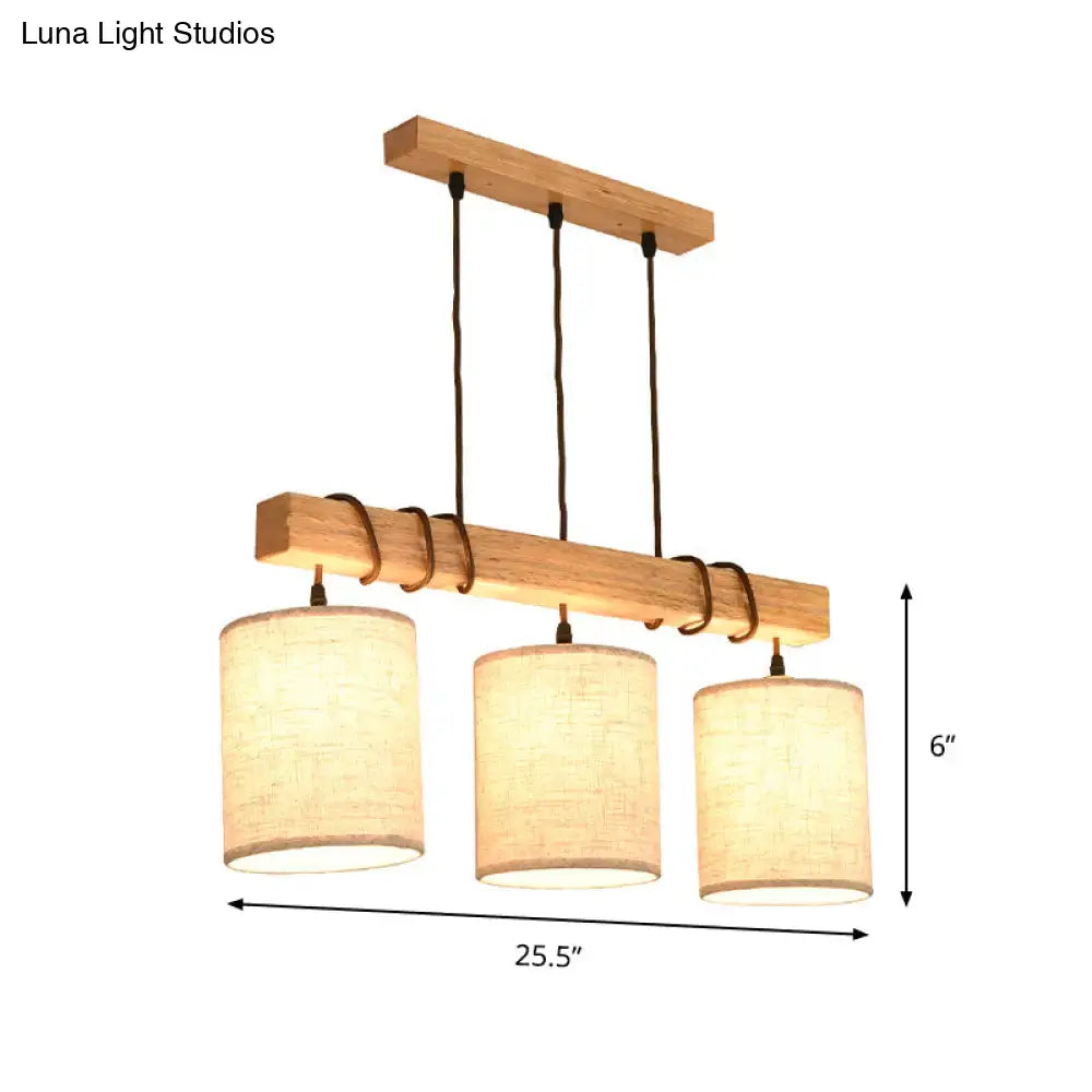 Modern wood and beige fabric island lighting fixture dining room