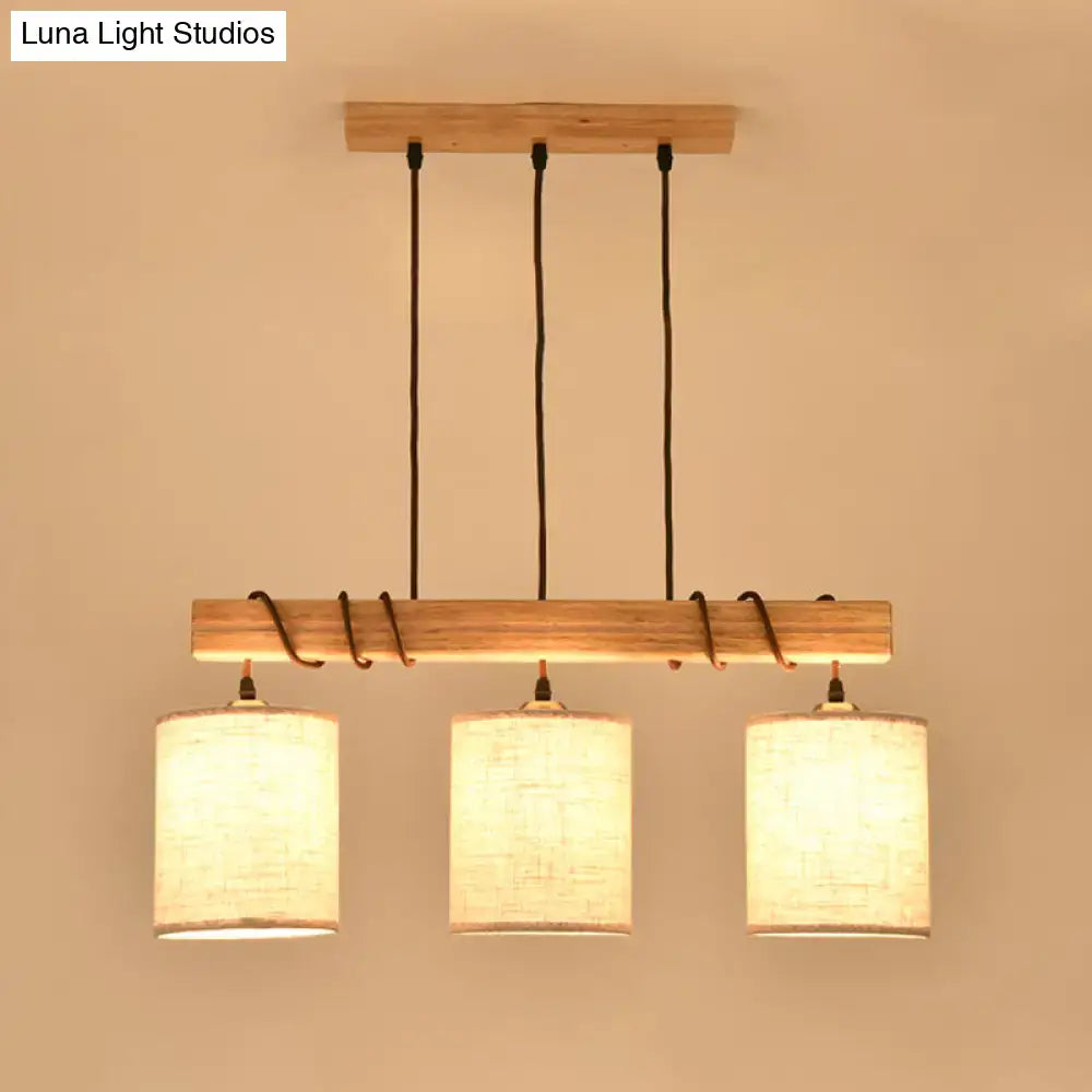 Modern wood and beige fabric island lighting fixture dining room