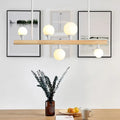 Modern wood island lamp with five globe lights dining room