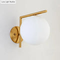 Modernist gold and white globe sconce light – bedroom wall lamp