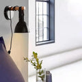 Black finish algunda plug wall sconce bedroom metal light with leather strap